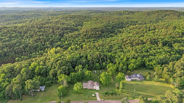 875-883 State Route T, West Plains, MO 65775 - aerial view of property and surrounding area featuring a heavily wooded area