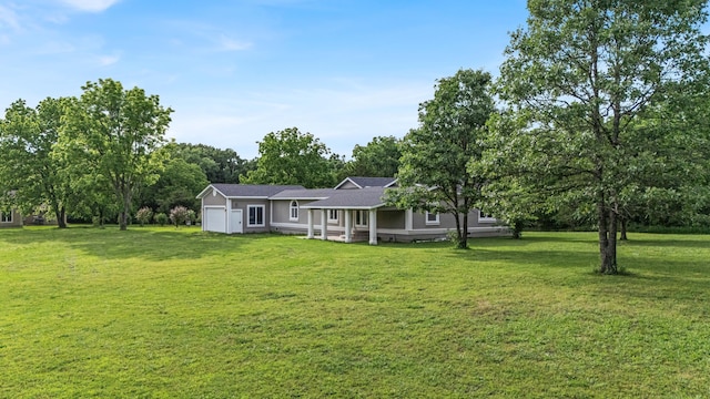 875-883 State Route T, West Plains, MO 65775 - view of front facade with a front yard and an attached garage