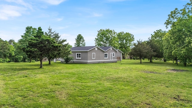 875-883 State Route T, West Plains, MO 65775 - back of property with a lawn and a deck