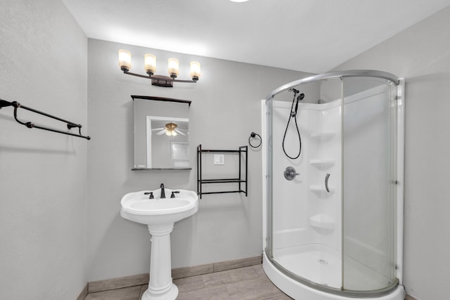 875-883 State Route T, West Plains, MO 65775 - full bath with a shower stall, ceiling fan, and baseboards
