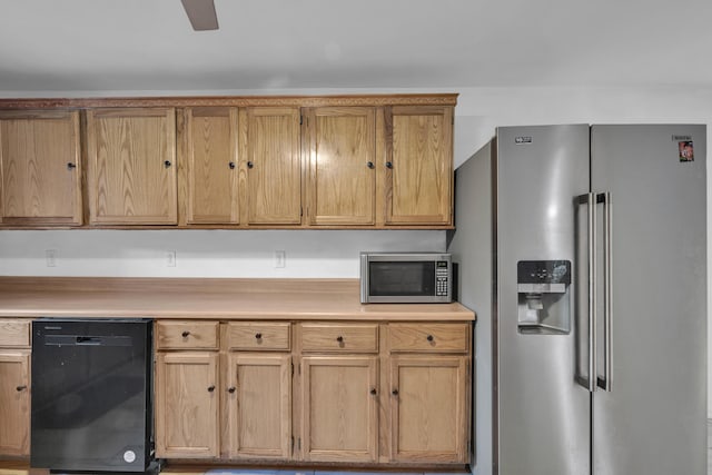 875-883 State Route T, West Plains, MO 65775 - kitchen featuring stainless steel appliances, light countertops, and a ceiling fan