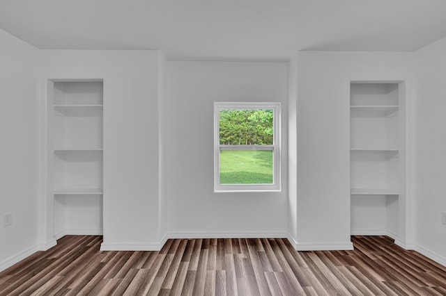 875-883 State Route T, West Plains, MO 65775 - unfurnished bedroom with dark wood-type flooring and baseboards