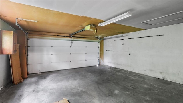 619 E Mcgee St Lot 15, Springfield, MO 65807 - garage featuring a garage door opener