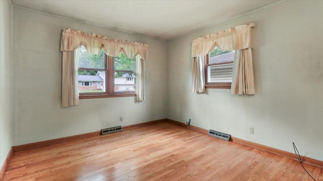 619 E Mcgee St Lot 15, Springfield, MO 65807 - spare room with light wood finished floors, plenty of natural light, and baseboards