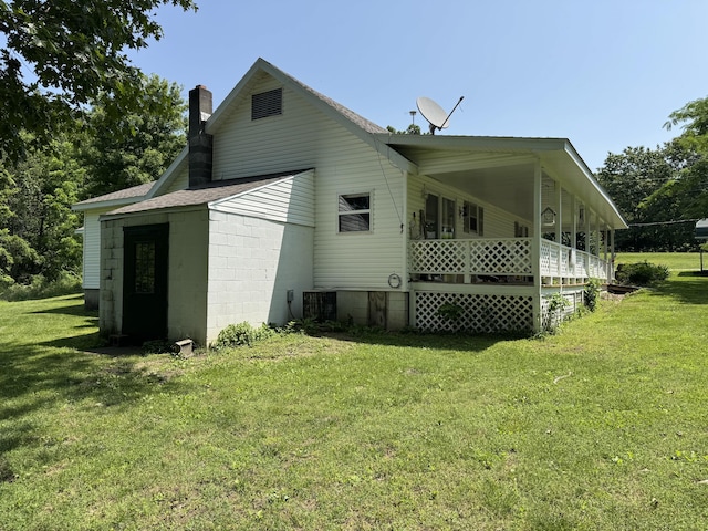 10623 State Highway O, Ava, MO 65608 - view of home's exterior featuring a chimney, a yard, a shingled roof, and covered porch