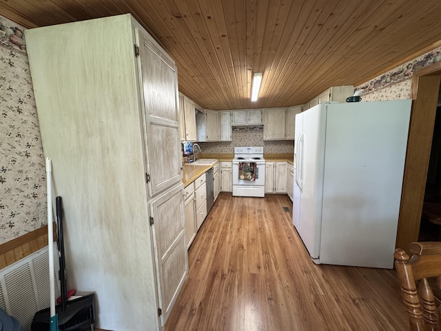 10623 State Highway O, Ava, MO 65608 - kitchen with white appliances, wallpapered walls, a sink, wooden ceiling, and light wood-style floors