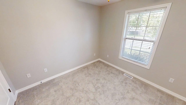 780 S Timber Ridge Dr, Nixa, MO 65714 - spare room with light colored carpet and baseboards