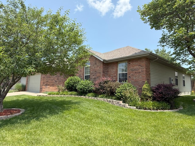 780 S Timber Ridge Dr, Nixa, MO 65714 - view of property exterior with brick siding, a lawn, a garage, and roof with shingles