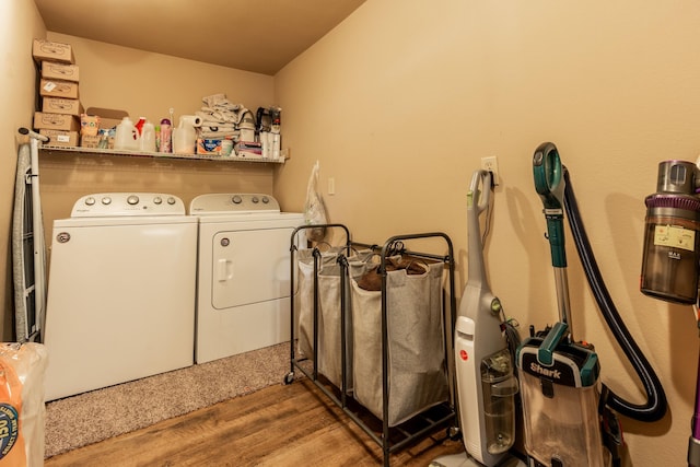 1501 NE 775th Rd, Osceola, MO 64776 - washroom with separate washer and dryer and wood finished floors