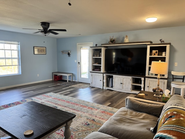 3600 Steven Dr, Cabool, MO 65689 - living area with wood finished floors, ceiling fan, and baseboards