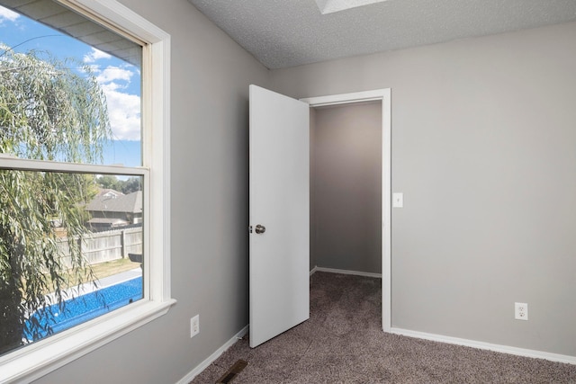 617 E SE Hills Ct, Nixa, MO 65714 - carpeted spare room with healthy amount of natural light and baseboards
