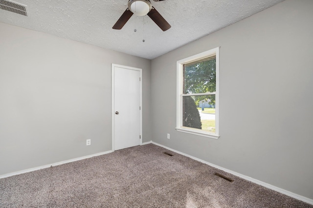 617 E SE Hills Ct, Nixa, MO 65714 - unfurnished room featuring ceiling fan, a textured ceiling, carpet flooring, and baseboards