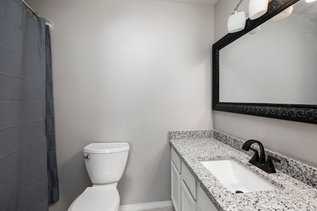 617 E SE Hills Ct, Nixa, MO 65714 - bathroom with toilet, vanity, a shower with curtain, and baseboards