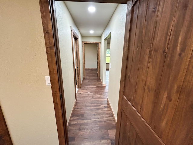 19040 Norway Rd, Neosho, MO 64850 - corridor featuring dark wood-style floors, baseboards, a textured wall, and recessed lighting