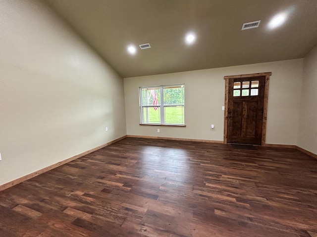 19040 Norway Rd, Neosho, MO 64850 - empty room with dark wood-type flooring, baseboards, recessed lighting, and high vaulted ceiling