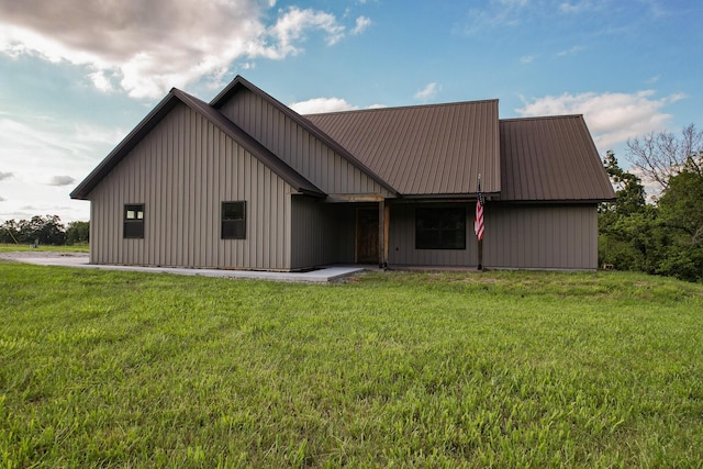 19040 Norway Rd, Neosho, MO 64850 - view of front of property with a front yard, metal roof, and board and batten siding