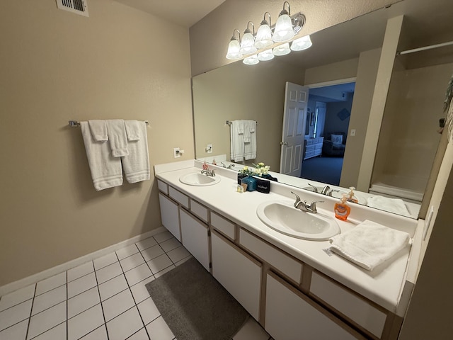 132 Highland Dr Unit 2, Branson, MO 65616 - full bath with double vanity, tile patterned flooring, and baseboards