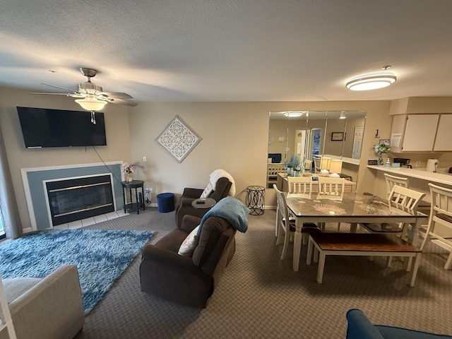 132 Highland Dr Unit 2, Branson, MO 65616 - carpeted living area featuring ceiling fan and a glass covered fireplace