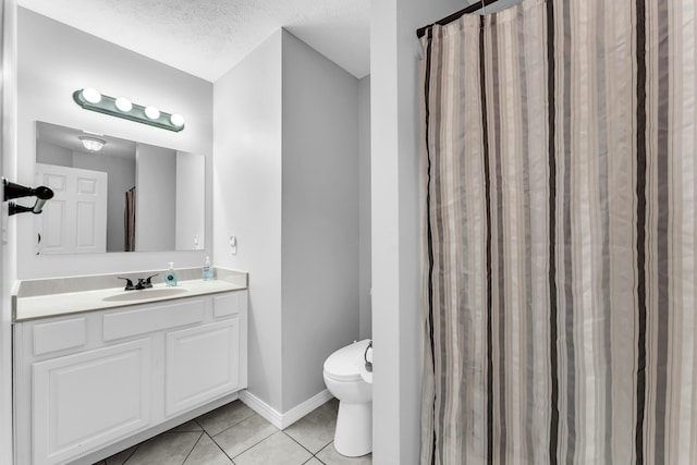 1108 E Robin St, Ozark, MO 65721 - full bathroom featuring tile patterned flooring, vanity, toilet, baseboards, and a textured ceiling