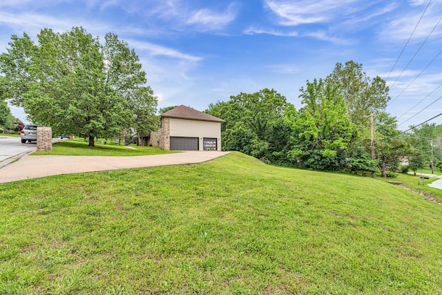 1108 E Robin St, Ozark, MO 65721 - view of grassy yard with a detached garage