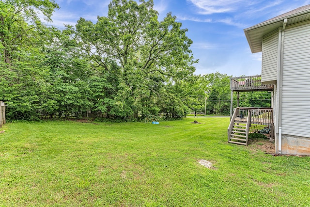 1108 E Robin St, Ozark, MO 65721 - view of green lawn featuring a wooden deck and stairs