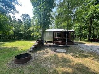 20001 Clear Lake Ter, Winona, MO 65588 - view of green lawn with an outbuilding and exterior structure