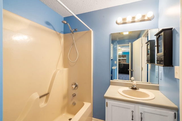 6 Cedar Ln, Kimberling City, MO 65686 - bathroom with shower / washtub combination, vanity, and a textured ceiling