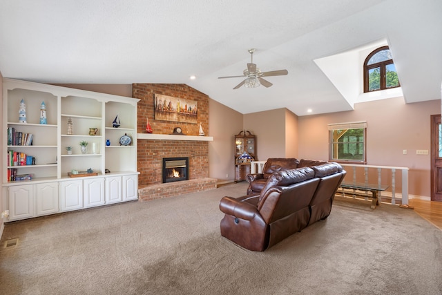 6 Cedar Ln, Kimberling City, MO 65686 - living area with lofted ceiling, ceiling fan, light carpet, and a fireplace