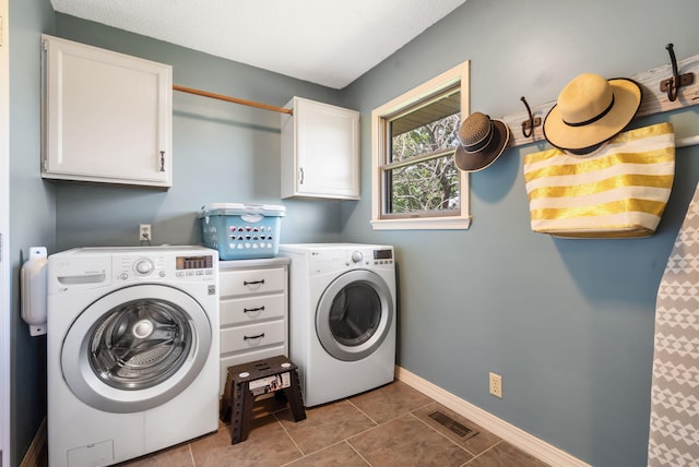 6 Cedar Ln, Kimberling City, MO 65686 - laundry area with cabinet space, washer and dryer, baseboards, and tile patterned flooring