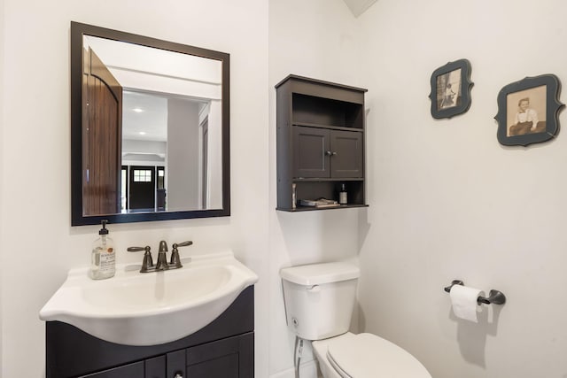 403 S 3rd St, Ozark, MO 65721 - half bath featuring toilet, vanity, and baseboards