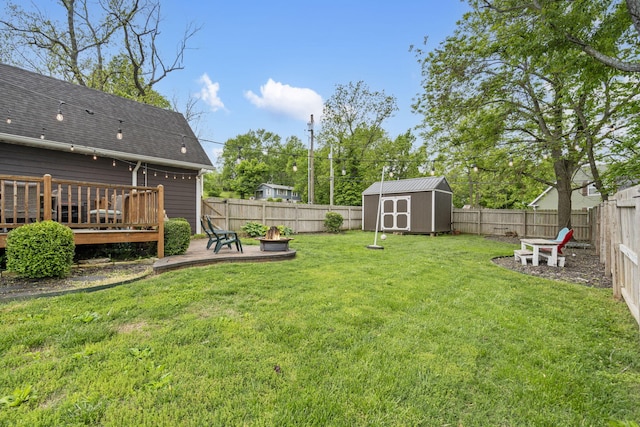403 S 3rd St, Ozark, MO 65721 - view of yard featuring a deck and an outdoor fire pit