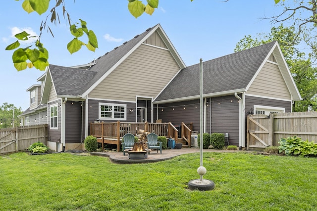 403 S 3rd St, Ozark, MO 65721 - rear view of house featuring a gate, a fire pit, a deck, roof with shingles, and a patio