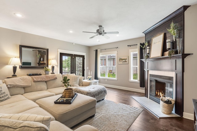 403 S 3rd St, Ozark, MO 65721 - living area with baseboards, a glass covered fireplace, recessed lighting, a ceiling fan, and dark wood-style flooring