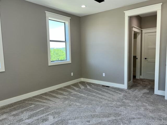 409 Silverwood Cir, Branson West, MO 65737 - carpeted spare room featuring baseboards and recessed lighting