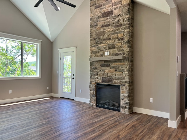 409 Silverwood Cir, Branson West, MO 65737 - unfurnished living room with a ceiling fan, lofted ceiling, a fireplace, dark wood-type flooring, and baseboards