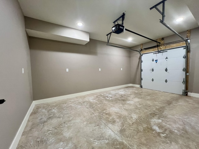 409 Silverwood Cir, Branson West, MO 65737 - garage with a garage door opener, baseboards, and recessed lighting