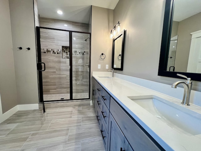 409 Silverwood Cir, Branson West, MO 65737 - full bath with double vanity, a shower stall, recessed lighting, and baseboards