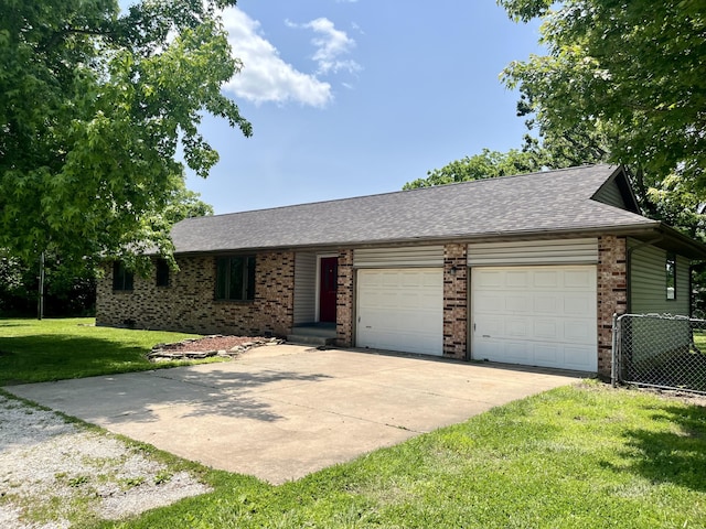 194 State Highway T, Oldfield, MO 65720 - ranch-style home with a garage, driveway, brick siding, and a shingled roof