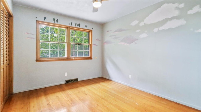1816 Lasswell St, West Plains, MO 65775 - unfurnished bedroom featuring wood finished floors, a closet, baseboards, and a ceiling fan