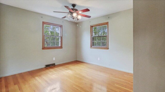 1816 Lasswell St, West Plains, MO 65775 - spare room with plenty of natural light, light wood-type flooring, and ceiling fan