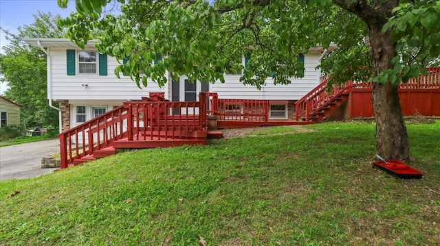 1816 Lasswell St, West Plains, MO 65775 - back of house with a lawn and stairway