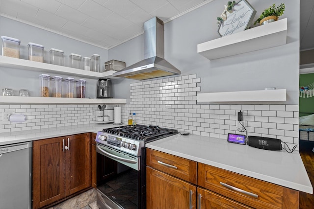 1103 4th St, Monett, MO 65708 - kitchen with open shelves, appliances with stainless steel finishes, wall chimney range hood, crown molding, and tasteful backsplash