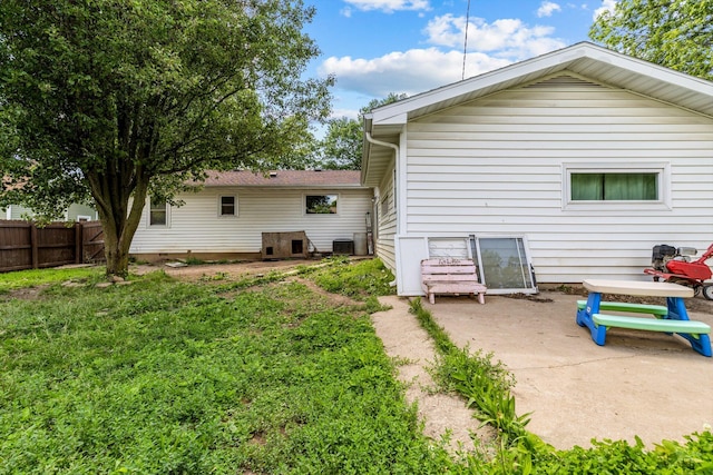 1103 4th St, Monett, MO 65708 - rear view of property featuring a patio area and cooling unit
