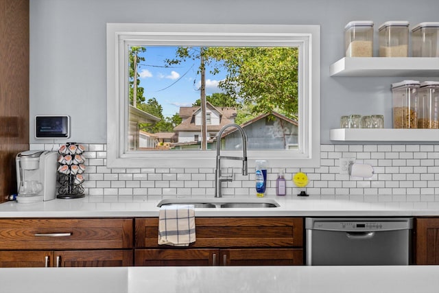 1103 4th St, Monett, MO 65708 - kitchen with dishwasher, a sink, backsplash, open shelves, and light countertops