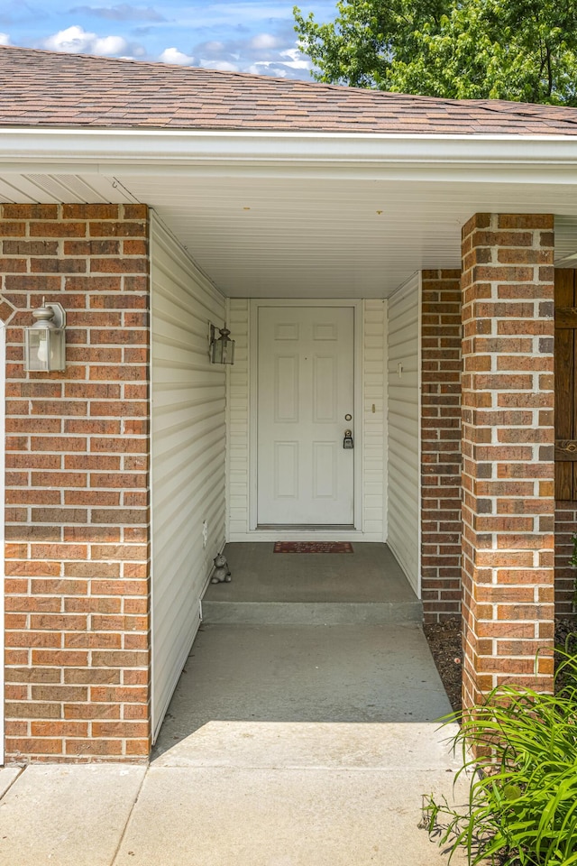 849 S Mahn Ave, Springfield, MO 65802 - property entrance featuring brick siding and roof with shingles