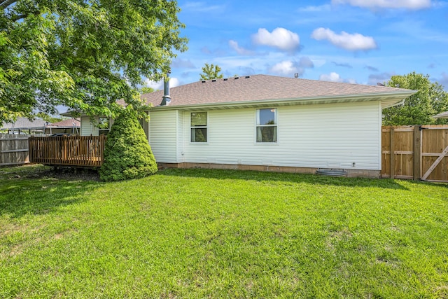 849 S Mahn Ave, Springfield, MO 65802 - rear view of house with a wooden deck and roof with shingles