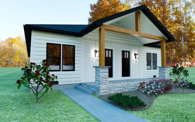 716-718 W Division St, Springfield, MO 65803 - view of front of house with a front lawn and board and batten siding