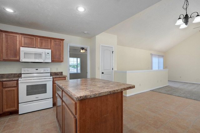 612-614 E Daniels St, Ozark, MO 65721 - kitchen with white appliances, brown cabinets, a chandelier, a kitchen island, and light colored carpet