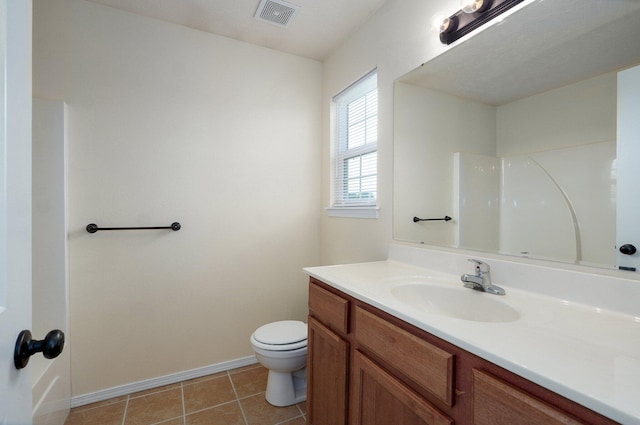 612-614 E Daniels St, Ozark, MO 65721 - bathroom with vanity, toilet, baseboards, and tile patterned floors