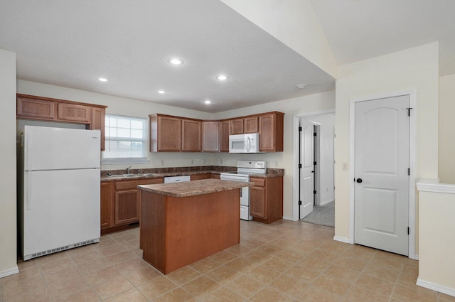 612-614 E Daniels St, Ozark, MO 65721 - kitchen with white appliances, recessed lighting, a kitchen island, a sink, and baseboards